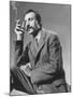 Armenian Artist Arshile Gorky Holding a Cigarette-Gjon Mili-Mounted Premium Photographic Print