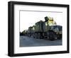 Armored Trucks Sit on the Pier at Morehead City, North Carolina, Awaiting Deployment-null-Framed Photographic Print
