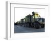 Armored Trucks Sit on the Pier at Morehead City, North Carolina, Awaiting Deployment-null-Framed Photographic Print