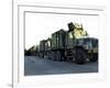 Armored Trucks Sit on the Pier at Morehead City, North Carolina, Awaiting Deployment-null-Framed Photographic Print