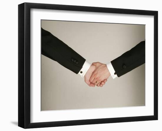 Arms of Male Couple Wearing Tuxedos Holding Hands, One with Wedding Band, Illustrating Gay Marriage-Ted Thai-Framed Premium Photographic Print