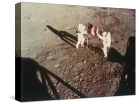 Armstrong and Aldrin Unfurl the Us Flag on the Moon, 1969-null-Stretched Canvas