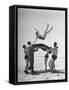 Army Men Bouncing Starlet Majorie Woodworth Into the Air-John Florea-Framed Stretched Canvas