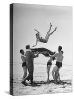 Army Men Bouncing Starlet Majorie Woodworth Into the Air-John Florea-Stretched Canvas