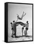Army Men Bouncing Starlet Majorie Woodworth Into the Air-John Florea-Framed Stretched Canvas