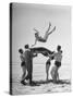 Army Men Bouncing Starlet Majorie Woodworth Into the Air-John Florea-Stretched Canvas