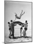 Army Men Bouncing Starlet Majorie Woodworth Into the Air-John Florea-Mounted Photographic Print