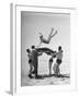 Army Men Bouncing Starlet Majorie Woodworth Into the Air-John Florea-Framed Photographic Print