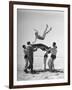 Army Men Bouncing Starlet Majorie Woodworth Into the Air-John Florea-Framed Photographic Print