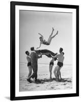 Army Men Bouncing Starlet Majorie Woodworth Into the Air-John Florea-Framed Photographic Print