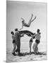 Army Men Bouncing Starlet Majorie Woodworth Into the Air-John Florea-Mounted Photographic Print