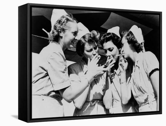 Army Nurses Lighting Up their Cigarettes in 1947-null-Framed Stretched Canvas