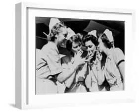 Army Nurses Lighting Up their Cigarettes in 1947-null-Framed Photo