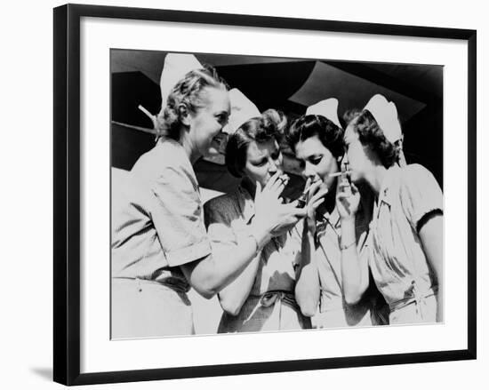 Army Nurses Lighting Up their Cigarettes in 1947-null-Framed Photo