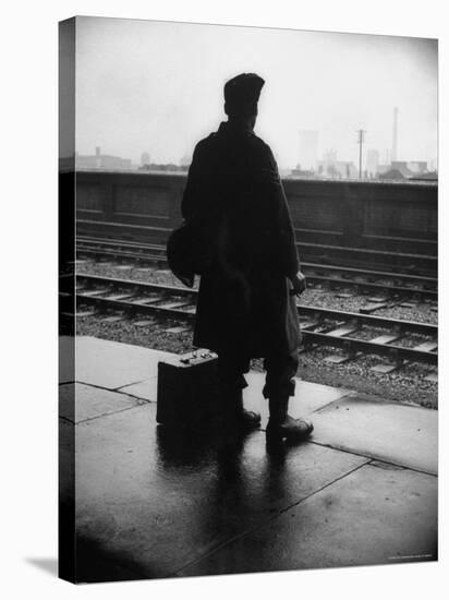Army Sergeant Visiting Home on Leave Waiting at the Railway Station-Bob Landry-Stretched Canvas