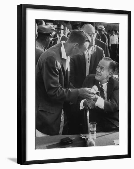 Arnold Palmer, Bobby Jones, Spectator at Masters' Tournament Play-Off-null-Framed Premium Photographic Print