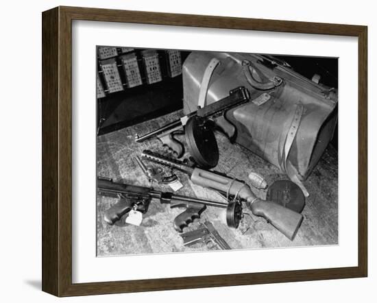 Arsenal of Machine Guns, Pistols, Shotguns Etc.- Belongs to Recently Captured Frank Dailey and Gang-Carl Mydans-Framed Photographic Print