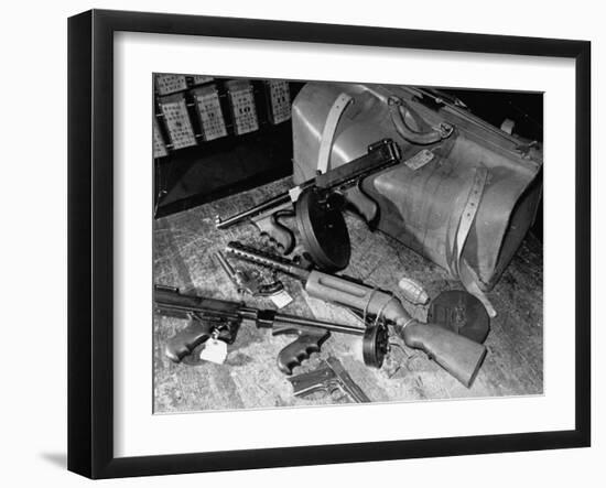 Arsenal of Machine Guns, Pistols, Shotguns Etc.- Belongs to Recently Captured Frank Dailey and Gang-Carl Mydans-Framed Photographic Print