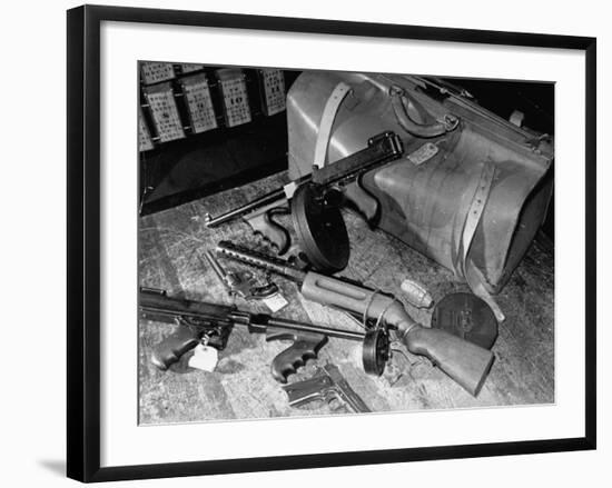 Arsenal of Machine Guns, Pistols, Shotguns Etc.- Belongs to Recently Captured Frank Dailey and Gang-Carl Mydans-Framed Photographic Print