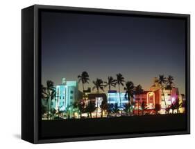 Art Deco Hotels at Dusk, Miami Beach, Florida, USA-Walter Bibikow-Framed Stretched Canvas