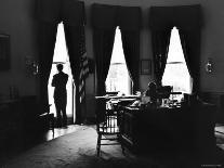 Pres. John F. Kennedy on Telephone While Brother, Attorney General Robert F. Kennedy Stands Nearby-Art Rickerby-Photographic Print