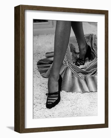 Artful Shot of Model Showing Off a Pair of High Heel Shoes-Nina Leen-Framed Photographic Print