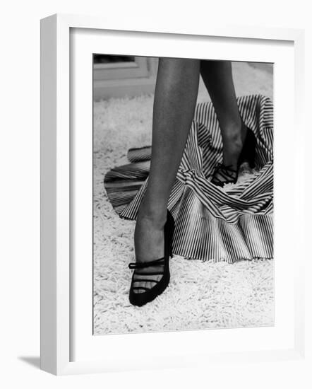 Artful Shot of Model Showing Off a Pair of High Heel Shoes-Nina Leen-Framed Photographic Print