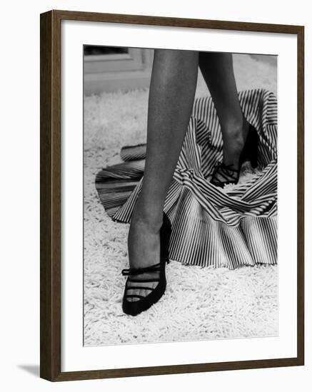 Artful Shot of Model Showing Off a Pair of High Heel Shoes-Nina Leen-Framed Photographic Print