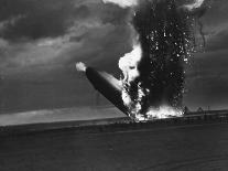 Hindenburg Zeppelin Bursting into Flames While Attempting to Land after 37th Ocean Crossing-Arthur Cofod-Photographic Print