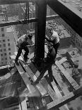 Workmen Attaching Steel Beams High Above Street During Construction of Manhattan Company Building-Arthur Gerlach-Stretched Canvas