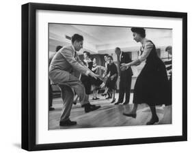 Arthur Murray and His Wife, While Giving a Rock 'N' Roll Demonstration-null-Framed Photographic Print