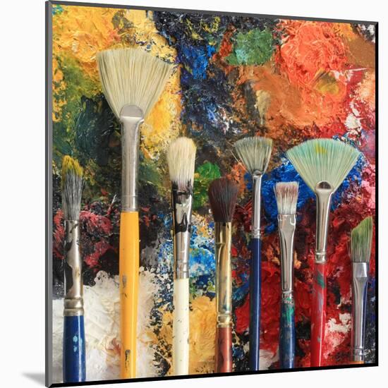 Artist Brushes On An Oil Painting Background-Hannamariah-Mounted Art Print