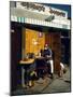 Artist Ed Kienholz Drinking Coffee Inside Section of His Assemblage "The Beanery. "-Ralph Crane-Mounted Photographic Print