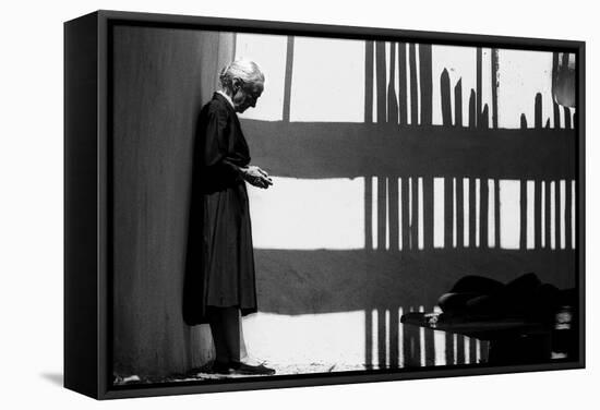 Artist Georgia O'Keeffe Against a Wall Amidst the Shadows of a Fence, Abiquiu, New Mexico, 1966-John Loengard-Framed Stretched Canvas