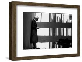 Artist Georgia O'Keeffe Against a Wall Amidst the Shadows of a Fence, Abiquiu, New Mexico, 1966-John Loengard-Framed Photographic Print