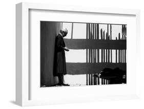 Artist Georgia O'Keeffe Against a Wall Amidst the Shadows of a Fence, Abiquiu, New Mexico, 1966-John Loengard-Framed Photographic Print