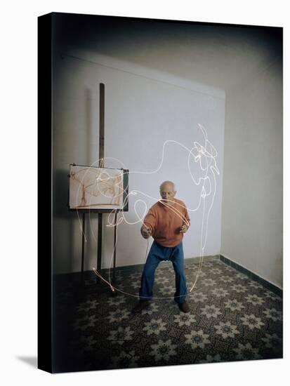 Artist Pablo Picasso Attempting to Draw a Minotaur Using Light Pen, Vallauris, France, 1949-Gjon Mili-Stretched Canvas