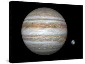 Artist's Concept Comparing the Size of the Gas Giant Jupiter with That of the Earth-Stocktrek Images-Stretched Canvas