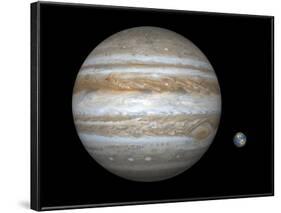 Artist's Concept Comparing the Size of the Gas Giant Jupiter with That of the Earth-Stocktrek Images-Framed Photographic Print