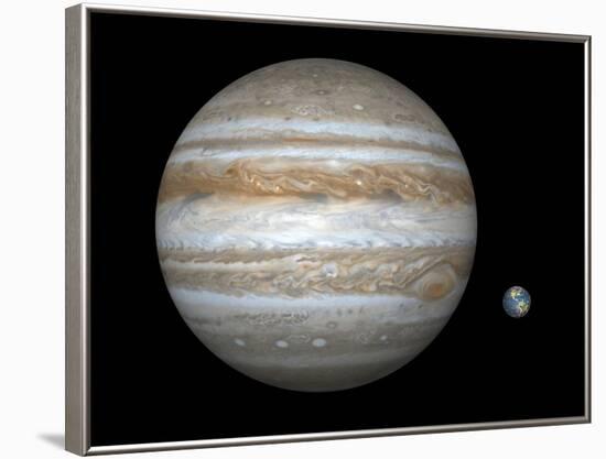 Artist's Concept Comparing the Size of the Gas Giant Jupiter with That of the Earth-Stocktrek Images-Framed Photographic Print