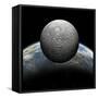 Artist's Depiction of a Heavily Cratered Moon in Orbit around it's Home Planet-null-Framed Stretched Canvas