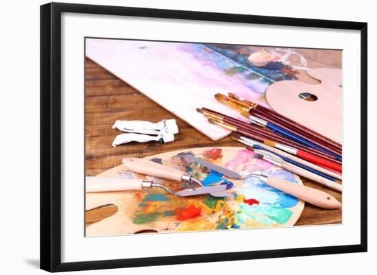 Artistic Equipment: Paint, Brushes and Art Palette on Wooden Table-Yastremska-Framed Art Print