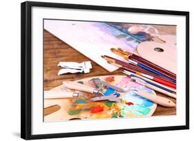 Artistic Equipment: Paint, Brushes and Art Palette on Wooden Table-Yastremska-Framed Art Print