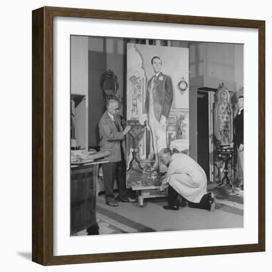 Artists Malvin Albright and Ivan Albright, Working on their Portrait of "Dorian Gray"-null-Framed Premium Photographic Print