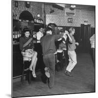 As the Communists Approach, Chinese Hostess Waits While American Seamen Cut Up in the Lear Bar-null-Mounted Photographic Print