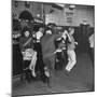 As the Communists Approach, Chinese Hostess Waits While American Seamen Cut Up in the Lear Bar-null-Mounted Photographic Print