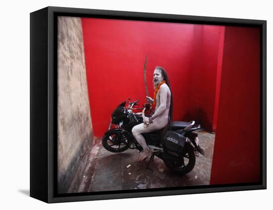 Ash Smeared Naked Hindu Holy Man, Poses on a Motorcycle at the Kumbh Mela Festival in India-null-Framed Stretched Canvas