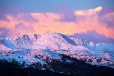 View of sunset over mountains with flying swift, Cumbria, UK-Ashley Cooper-Photographic Print