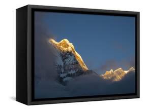 Asia, Nepal, Annapurna Base Camp. Annapurna South peak at sunrise with clouds below.-Merrill Images-Framed Stretched Canvas