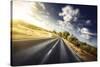 Asphalt Road in Field Against Moody Clouds at Sunset, Tuscany, Italy-null-Stretched Canvas